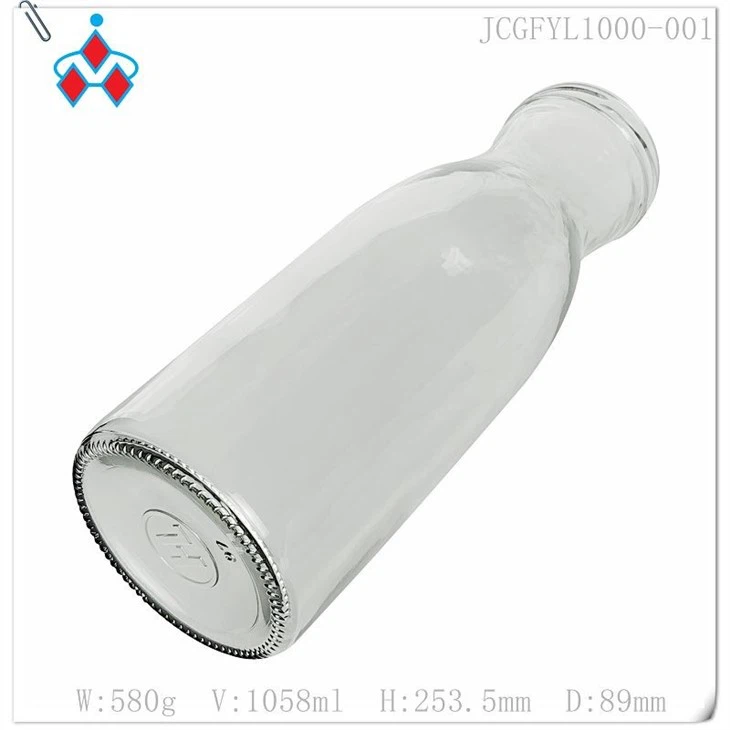 Glass orange juice bottle in stock
